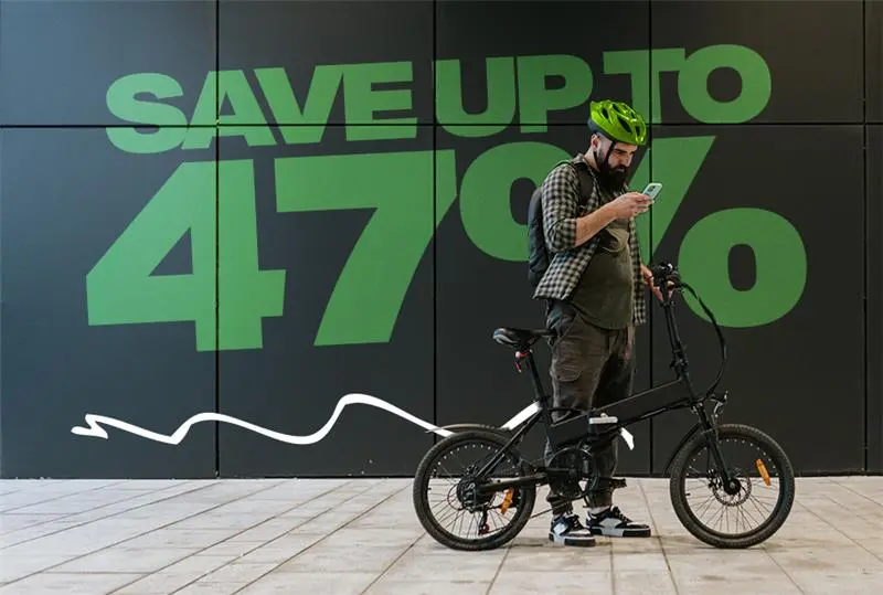 Person cycling to work with savings percentage overlay