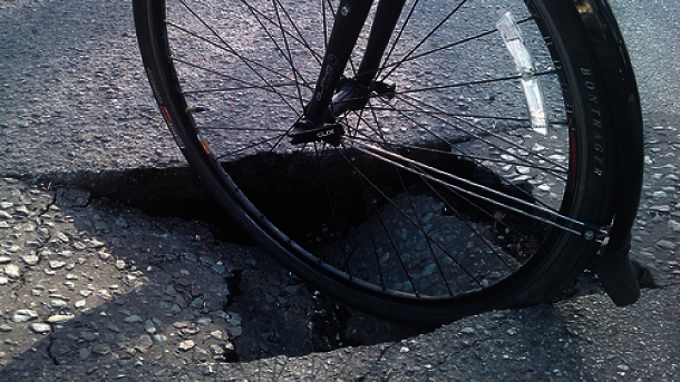 Riding on potholed roads